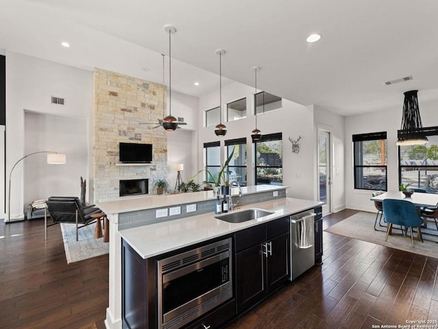 5922 Keller Rdg, New Braunfels, TX 78132 - kitchen featuring open floor plan, stainless steel appliances, light countertops, plenty of natural light, and recessed lighting