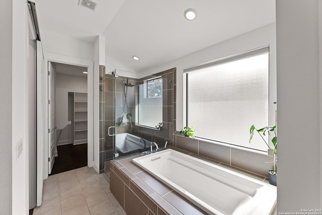 5922 Keller Rdg, New Braunfels, TX 78132 - bathroom featuring a shower stall, a garden tub, tile patterned floors, a walk in closet, and recessed lighting
