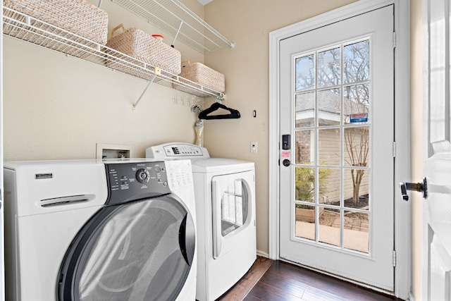 laundry area with laundry area, dark wood-style flooring, and washing machine and clothes dryer