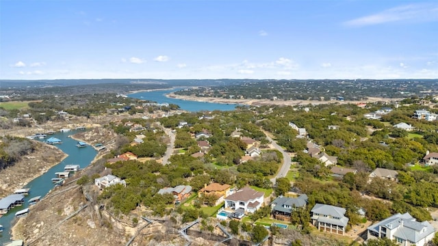 birds eye view of property featuring a water view and a residential view