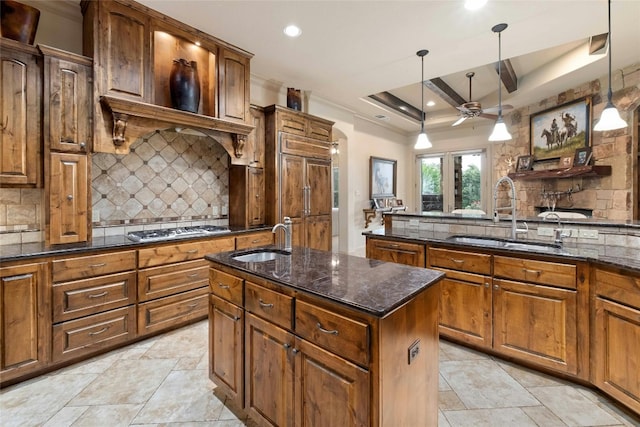 kitchen with recessed lighting, a sink, ceiling fan, and stainless steel gas stovetop