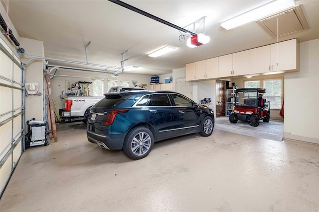 garage featuring a garage door opener