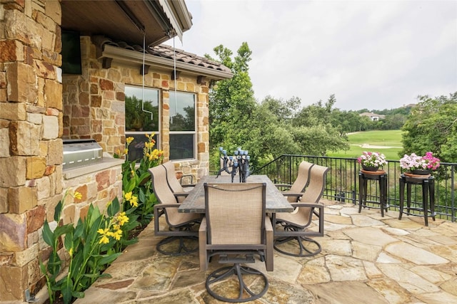 view of patio with outdoor dining area