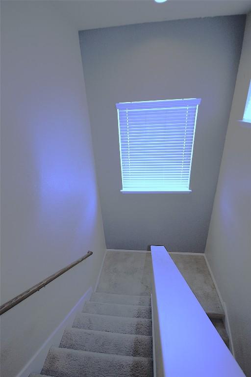 116 Four Star Dr, Elgin, TX 78621 - staircase featuring baseboards
