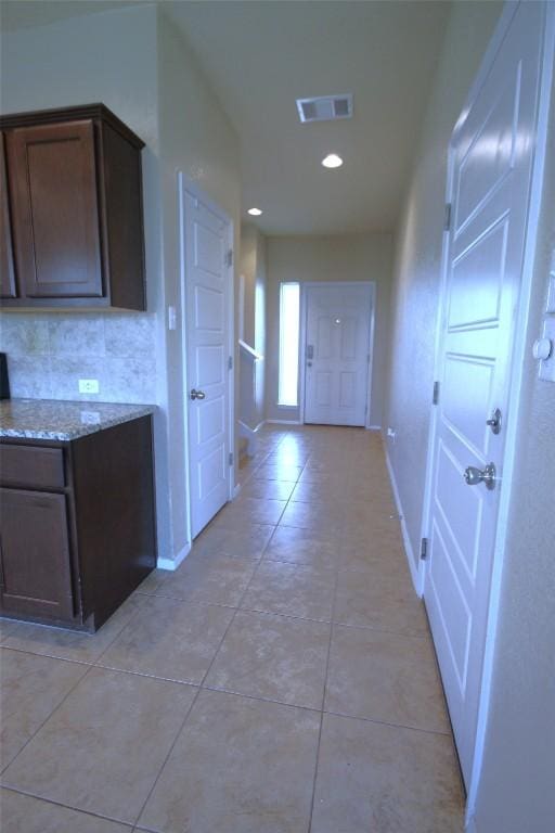 116 Four Star Dr, Elgin, TX 78621 - corridor featuring light tile patterned floors and recessed lighting