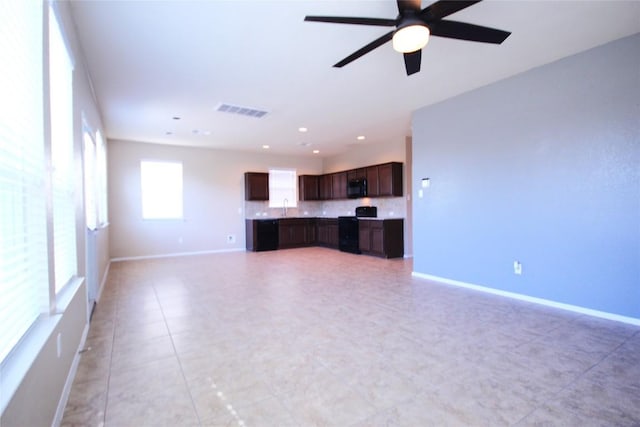116 Four Star Dr, Elgin, TX 78621 - unfurnished living room featuring a ceiling fan and recessed lighting