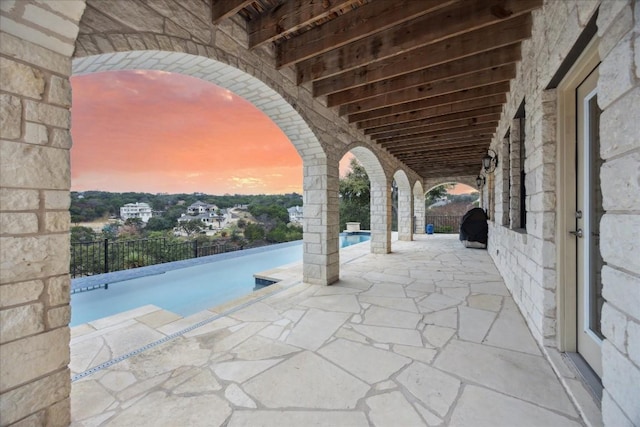 17813 Kingfisher Ridge Dr, Lago Vista, TX 78645 - patio terrace at dusk featuring a patio area