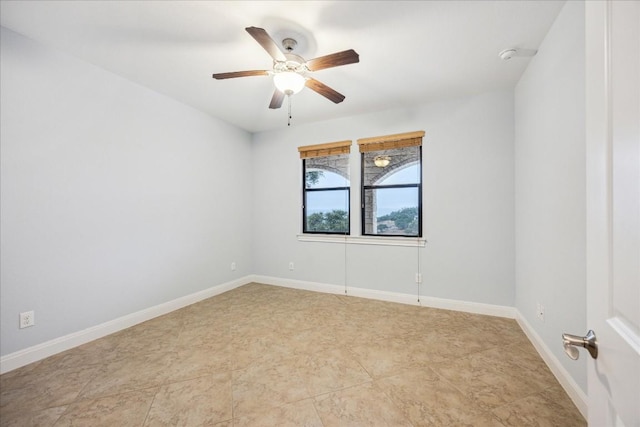 17813 Kingfisher Ridge Dr, Lago Vista, TX 78645 - spare room featuring ceiling fan, baseboards, and a smoke detector