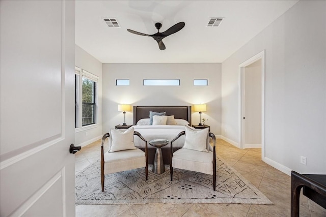 17813 Kingfisher Ridge Dr, Lago Vista, TX 78645 - tiled bedroom featuring baseboards and a ceiling fan