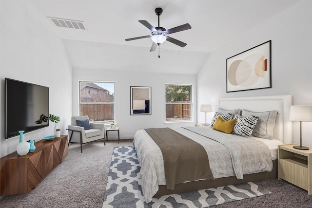 bedroom featuring vaulted ceiling, carpet floors, ceiling fan, and visible vents