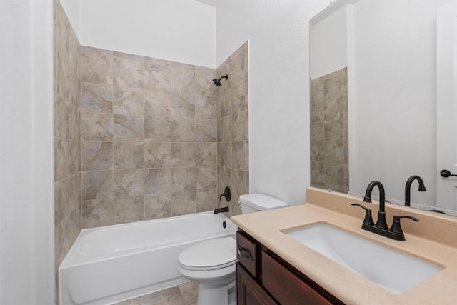 bathroom featuring shower / bathtub combination, vanity, and toilet