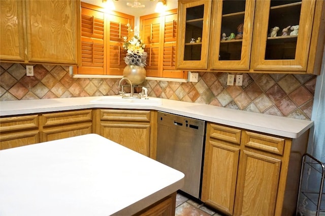 kitchen with dishwasher and light countertops