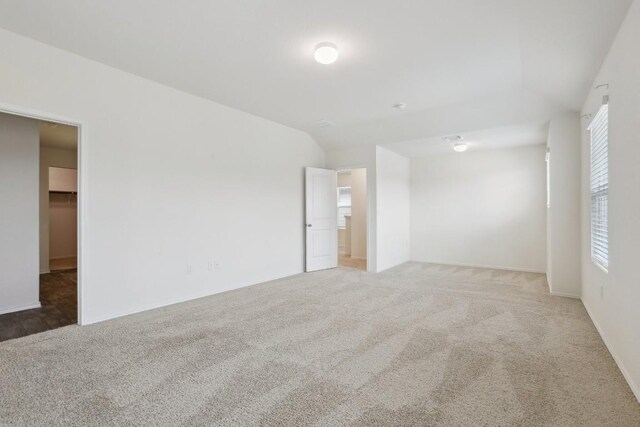 spare room featuring carpet flooring