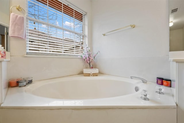 full bath featuring visible vents and a bath