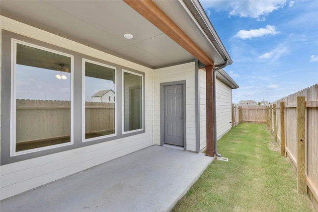 522 Ansley Ct, Taylor, TX 76574 - view of exterior entry featuring a patio