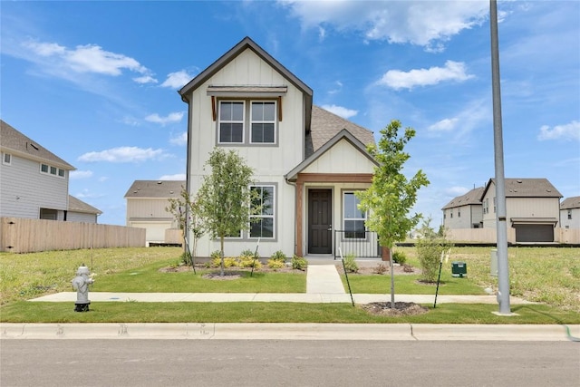 522 Ansley Ct, Taylor, TX 76574 - view of front of house featuring board and batten siding and roof with shingles