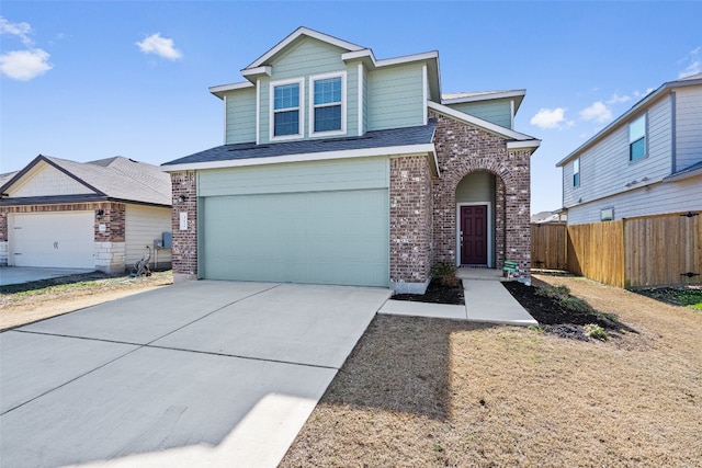 view of front of home featuring a garage, concrete driveway, brick siding, and fence