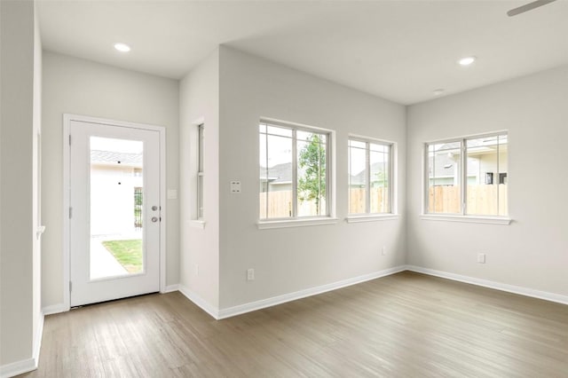 359 Witchhazel Way, San Marcos, TX 78666 - foyer with wood finished floors, baseboards, recessed lighting, and ceiling fan