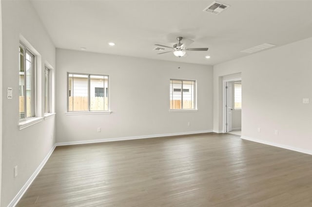 359 Witchhazel Way, San Marcos, TX 78666 - spare room featuring ceiling fan, dark wood-type flooring, recessed lighting, and baseboards
