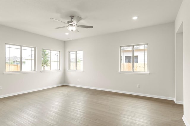 359 Witchhazel Way, San Marcos, TX 78666 - spare room with ceiling fan, baseboards, wood finished floors, and recessed lighting