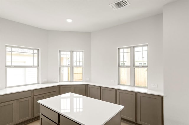 359 Witchhazel Way, San Marcos, TX 78666 - kitchen featuring light countertops, a center island, and recessed lighting