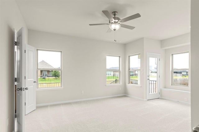359 Witchhazel Way, San Marcos, TX 78666 - empty room with light colored carpet and a ceiling fan