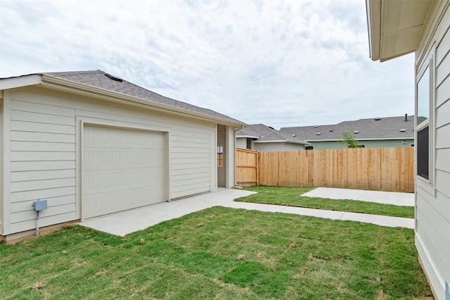 359 Witchhazel Way, San Marcos, TX 78666 - view of yard with a garage and a patio area