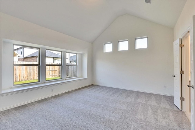 263 Diamondleaf Dr, Buda, TX 78610 - carpeted empty room featuring baseboards and high vaulted ceiling