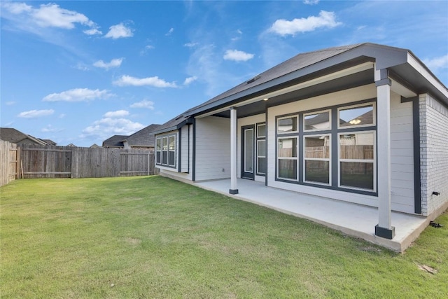 263 Diamondleaf Dr, Buda, TX 78610 - back of property with a patio area