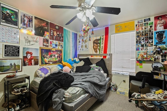 carpeted bedroom with a ceiling fan