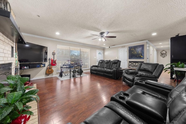 living area featuring ceiling fan, ornamental molding, wood finished floors, a textured ceiling, and recessed lighting