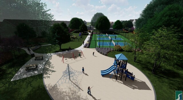 view of property's community with fence and a tennis court