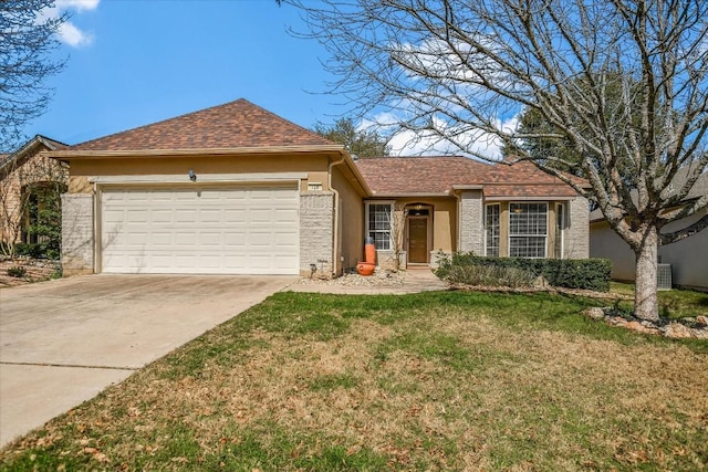 ranch-style house with driveway, a front lawn, an attached garage, and stucco siding