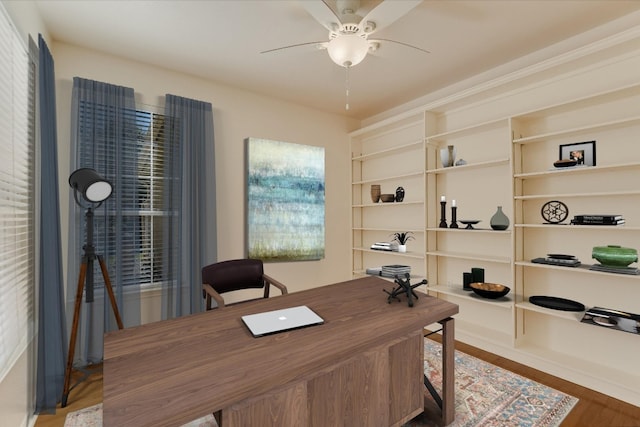 home office featuring ceiling fan and wood finished floors