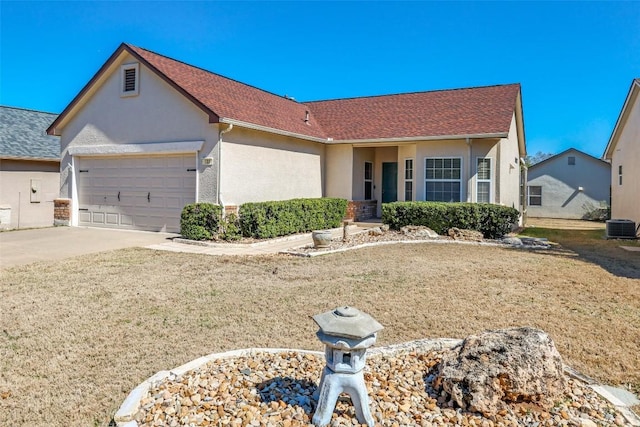 ranch-style house featuring concrete driveway, roof with shingles, an attached garage, cooling unit, and stucco siding