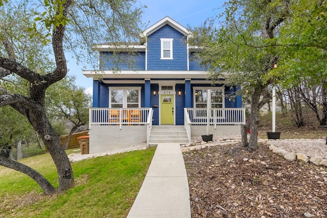 578 Firefly Dr, Canyon Lake, TX 78133 - view of front of home featuring a porch and a front yard