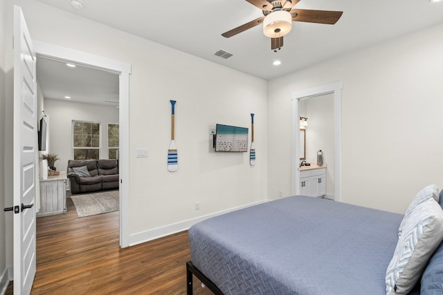 578 Firefly Dr, Canyon Lake, TX 78133 - bedroom featuring dark wood finished floors, recessed lighting, ensuite bathroom, and a ceiling fan
