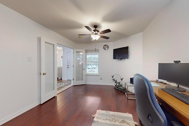 office space with dark wood-style floors, ceiling fan, baseboards, and french doors