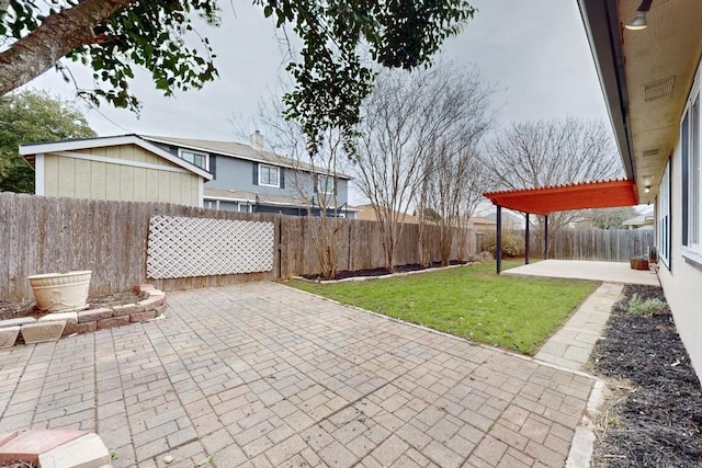 view of patio / terrace with a fenced backyard and a pergola