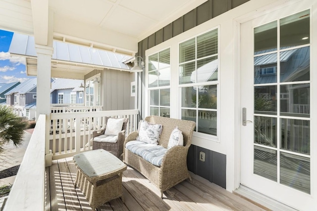 balcony featuring a sunroom