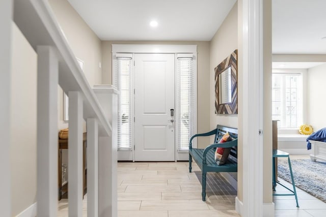 entrance foyer featuring wood tiled floor