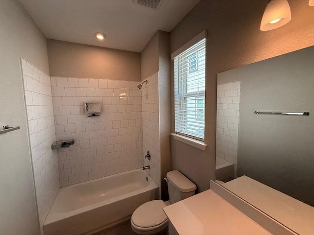 bathroom featuring toilet and washtub / shower combination