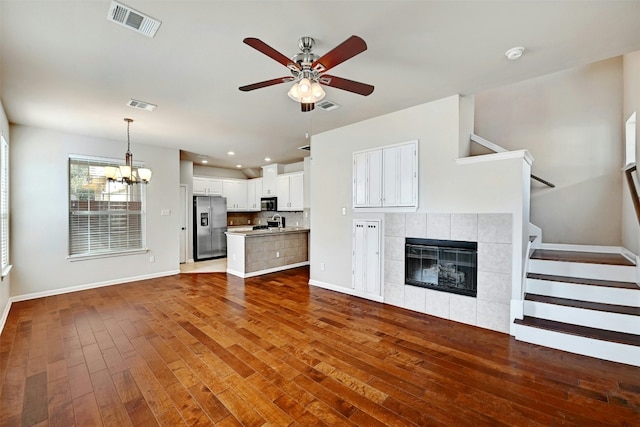 11000 Anderson Mill Rd Unit 52, Austin, TX 78750 - unfurnished living room featuring a ceiling fan, wood finished floors, baseboards, and recessed lighting