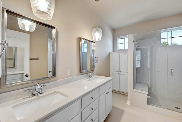 11000 Anderson Mill Rd Unit 52, Austin, TX 78750 - bathroom with a shower stall, double vanity, and tile patterned flooring