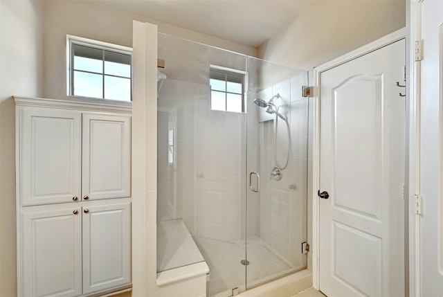 full bathroom featuring a shower stall