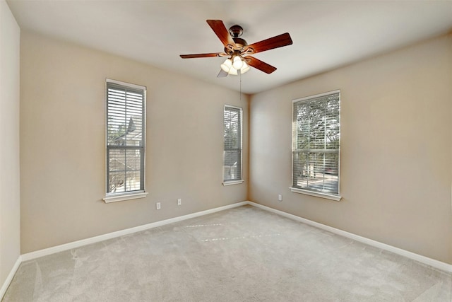 11000 Anderson Mill Rd Unit 52, Austin, TX 78750 - spare room featuring carpet flooring, baseboards, and ceiling fan