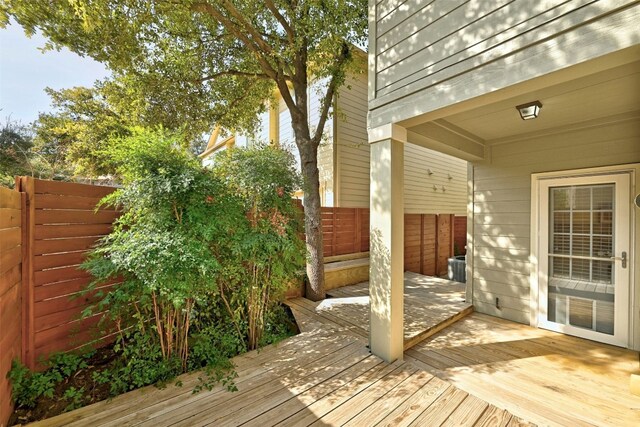 11000 Anderson Mill Rd Unit 52, Austin, TX 78750 - wooden terrace with a fenced backyard