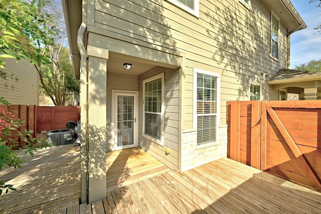 11000 Anderson Mill Rd Unit 52, Austin, TX 78750 - wooden terrace with cooling unit