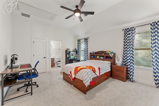 bedroom featuring attic access, visible vents, vaulted ceiling, and a ceiling fan