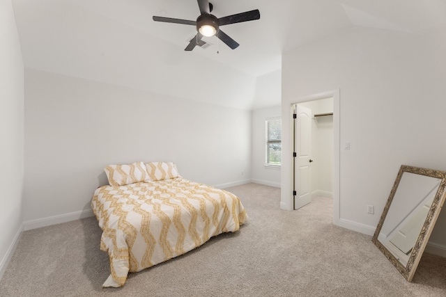 bedroom with lofted ceiling, baseboards, carpet floors, and ceiling fan